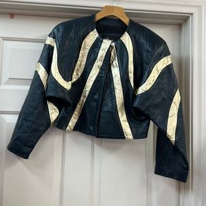 A beautiful shorts leather jacket dark green and gold